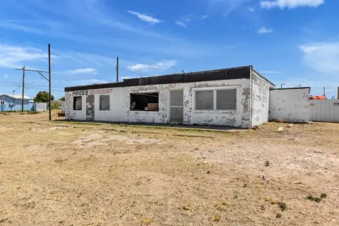 Corner Commercial Land with Existing Building