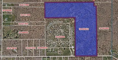 Zoned Commercial Wooded Land
