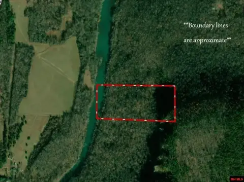 Secluded Riverfront Land with Acreage