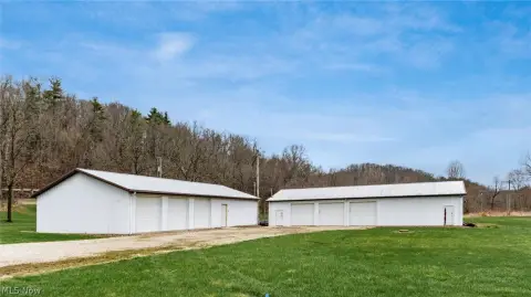 Versatile Land Parcel with Garages