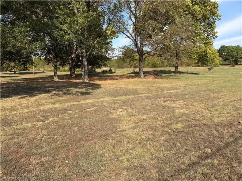 Open Farmland with Metal Shop