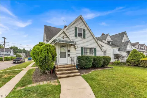Corner-Lot Duplex with Rear Sunrooms