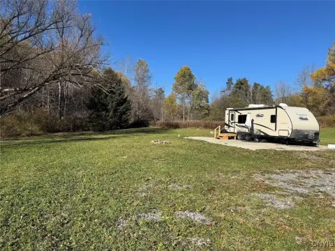 Land with Travel Trailer Included