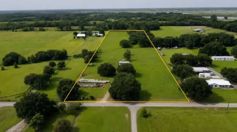 Fenced Agricultural Tract with Homesite