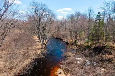 Secluded 40-Acre Riverfront Retreat