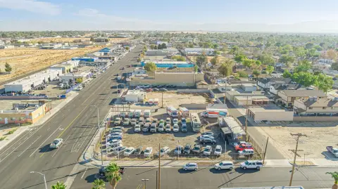 Corner Car Lot with Billboard