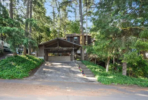 Treehouse-Style Duplex with EV Charging