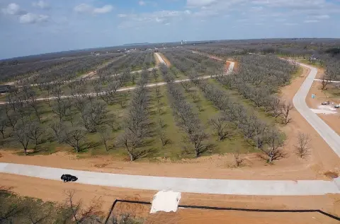 Gated Corner Residential Lot in Pecan Plantation