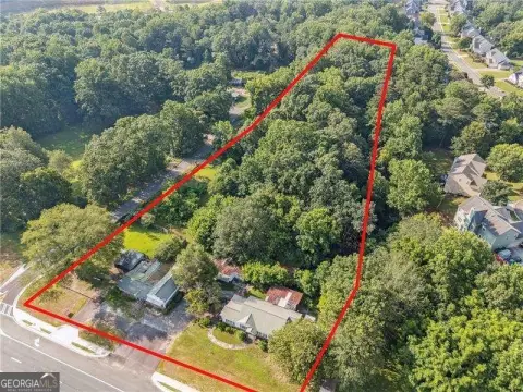 Dual-Zoned Commercial Land with Duplex