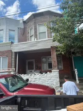 Tenant-Occupied Duplex with Backyard