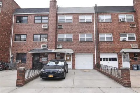 Woodside Two-Family Home with Garage