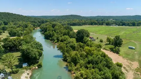 Fenced Agricultural Land with River Access