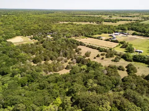 Wooded Acreage with Open Homesites