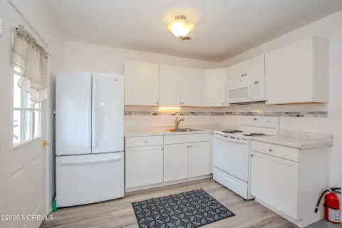 Updated Duplex with Screened Porch