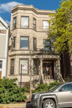 Legal Three-Unit Brick Building