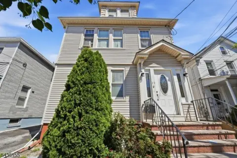 Three-Story Two-Family Residence
