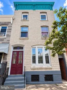 Brick Triplex with Detached Garage
