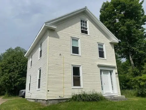Well-Maintained Duplex with Slate Roof