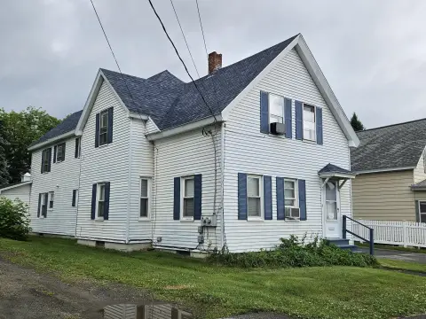 Remodeled Duplex with Enclosed Porches