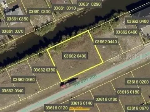 Cleared Canal-Front Commercial Lot