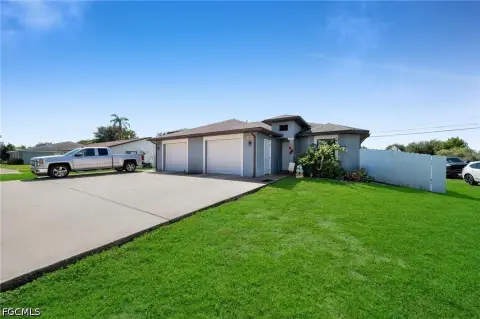 Corner-Lot Duplex with Private Lanais