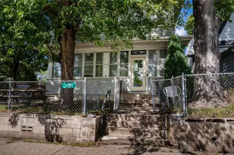 Stone Triplex With Detached Garage