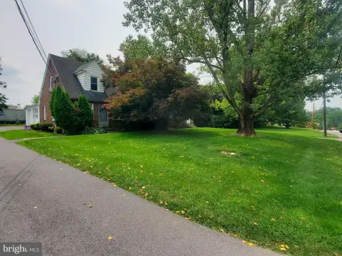 Brick Quadplex with Wrap-Around Driveway