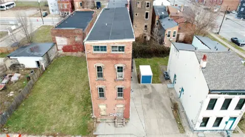 Converted 3-Unit Brick Multifamily