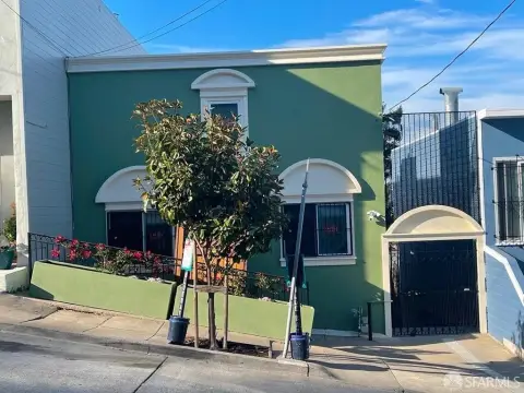 Remodeled Duplex with Two Decks