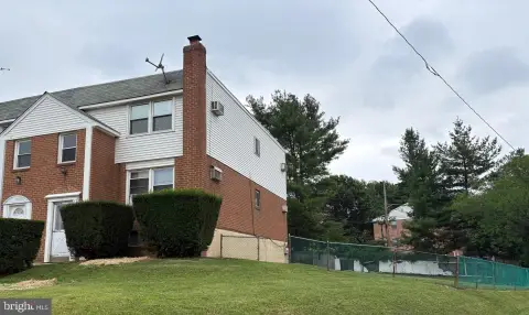 Well-Maintained Duplex with Side Yard