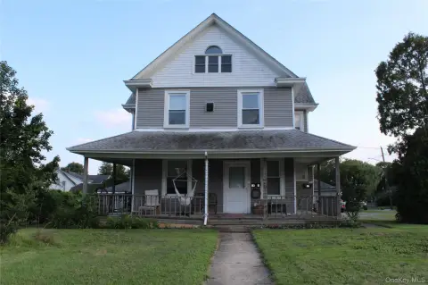 Legal Triplex with Detached Garages