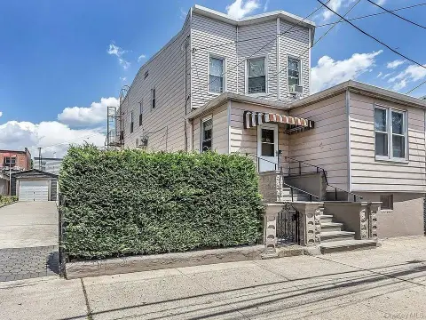 Spacious Three-Family Home with Extra Lot
