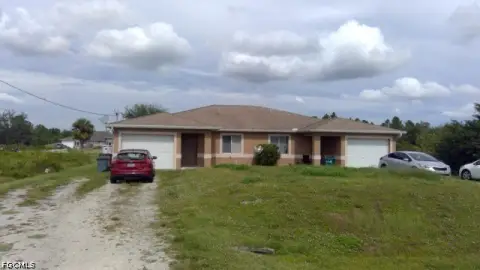 Three-Bedroom Duplex with Garages
