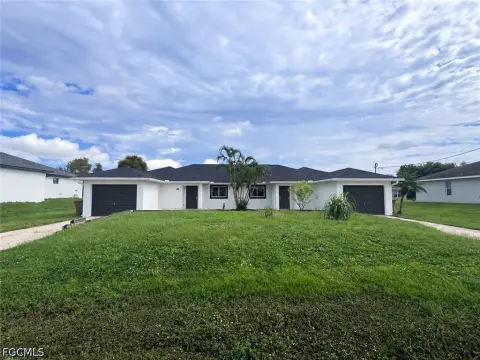 Remodeled Duplex with Garages