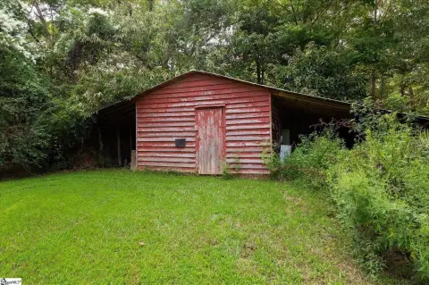 Land with Farmhouse and Creek