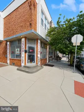 Mixed-Use Corner Duplex Property
