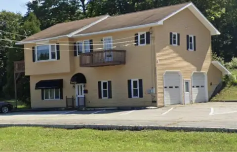 Mixed-Use Property with Garage Bays