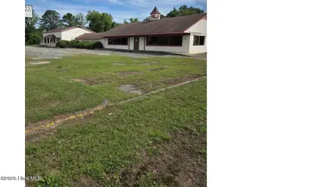 Commercial Land with Existing Structure