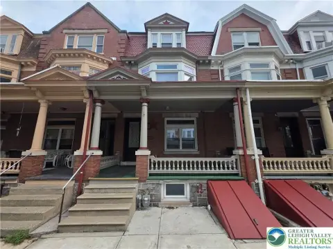 Brick Triplex With Detached Garage