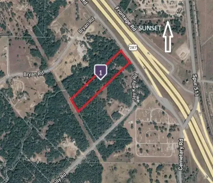 Timbered Commercial Land with Highway Frontage