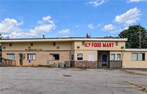 Corner-Lot Storefront Building