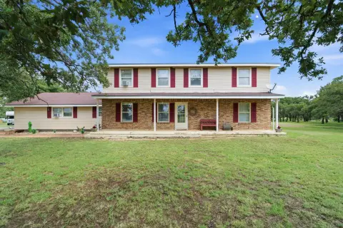 Country Land with Two-Story Home