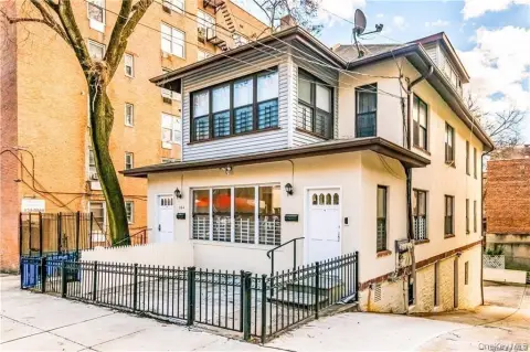 Brick Triplex with Bi-Level Layout