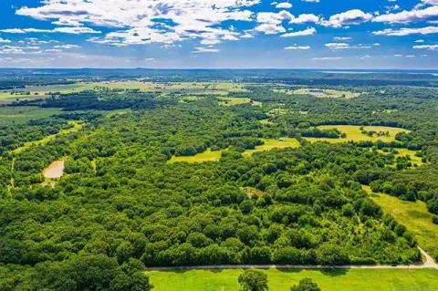 Heavily Wooded Hunting Land with Ponds