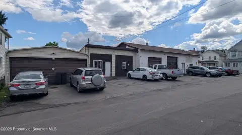 Automotive Garage and Apartment Building