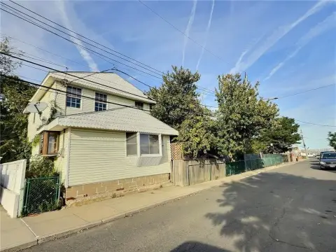 Two Homes, Expansive Corner Lot