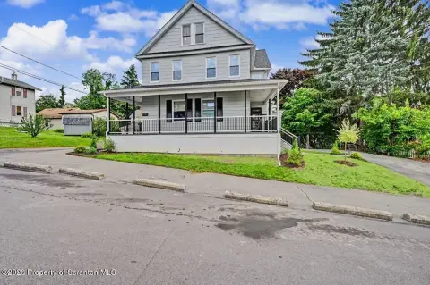 Updated Two-Family Home with Driveway