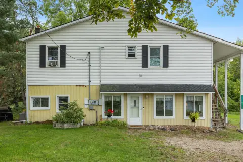 Duplex with Storage Outbuilding