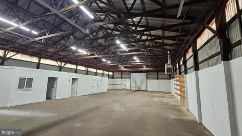 Warehouse with Fenced Storage Yard