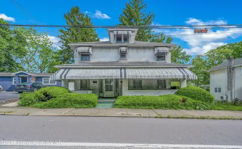 Two-Family Duplex with Private Balcony